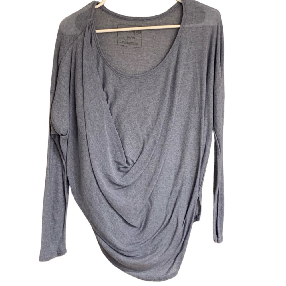 We The FREE light blue asymmetrical top, lightweight size medium